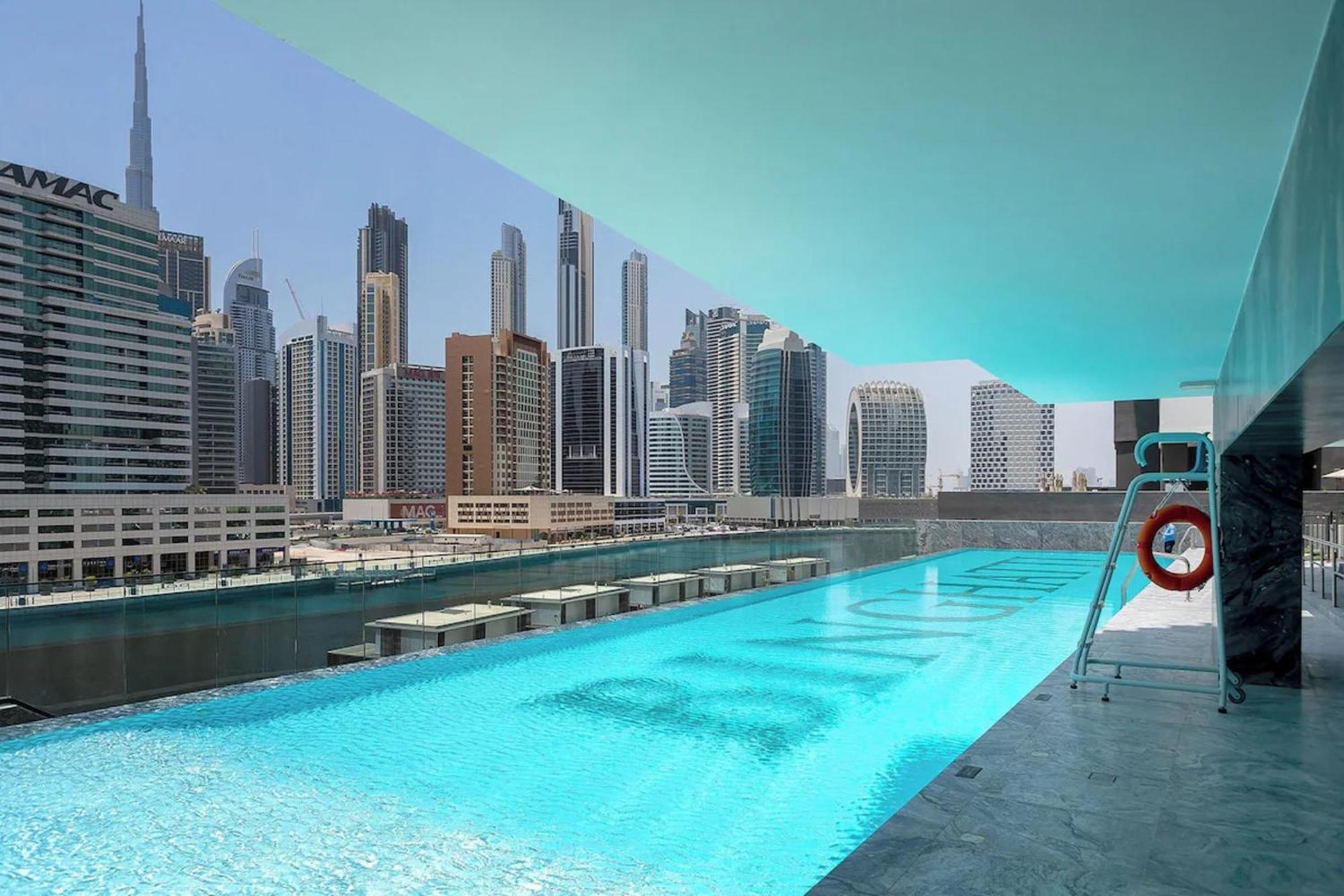 Fam Living Modern Smart At Business Bay With Iconic Burj And Canal Views Dubai
