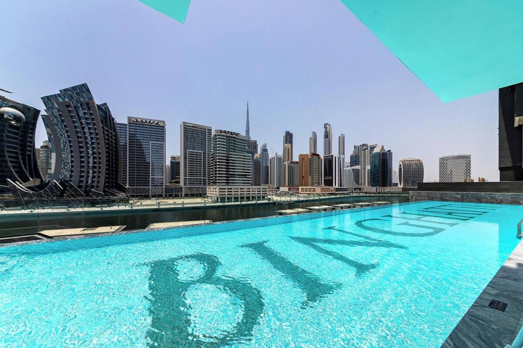 Apartment Fam Living Modern Smart At Business Bay With Iconic Burj And Canal Views